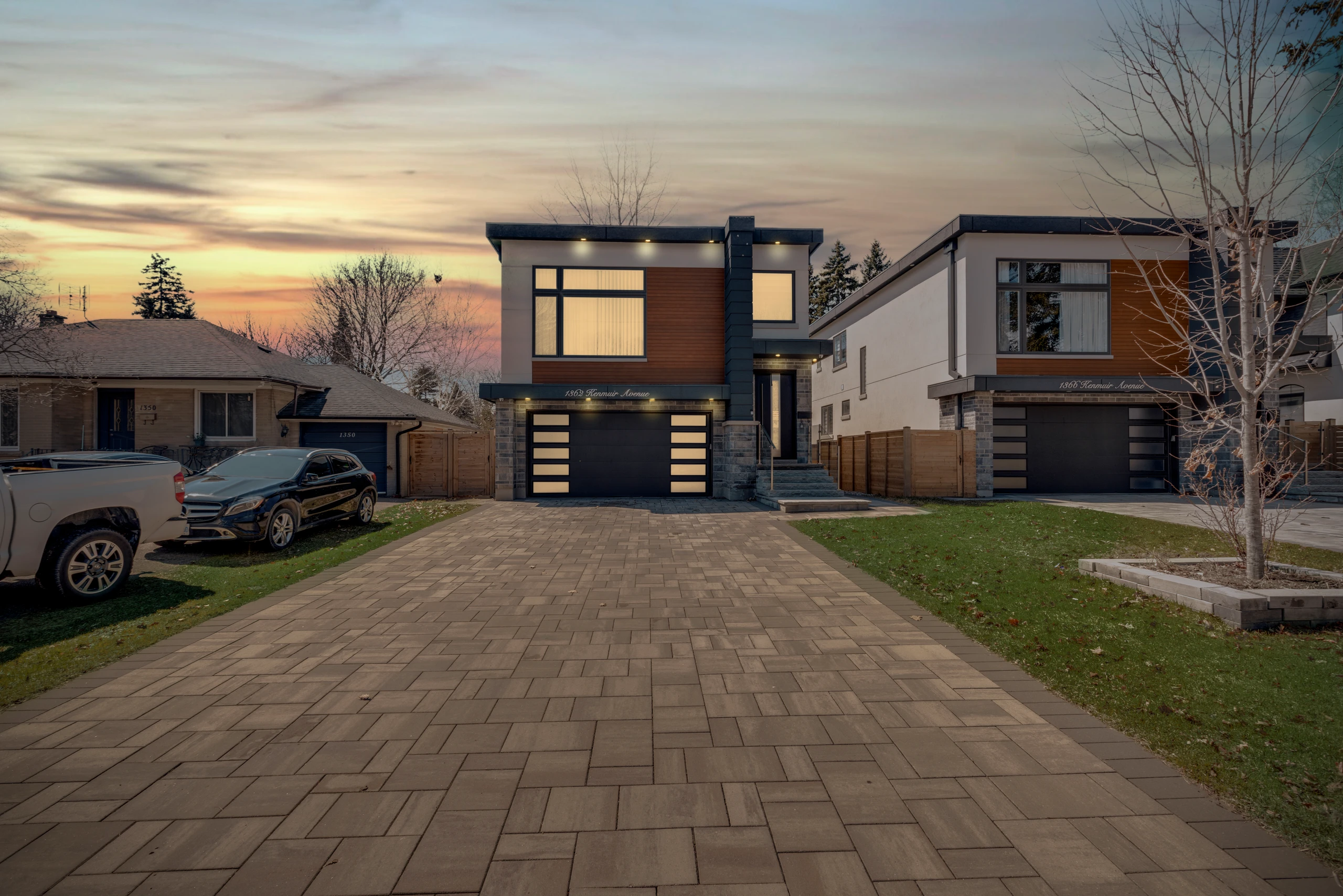 Digital twilight edited exterior photograph of a home on Kenmuir Avenue, warm interior light and dusk sky. RCG Canada